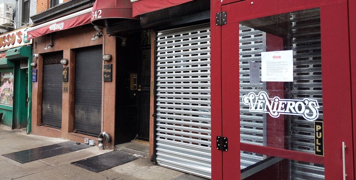 Small businesses along a street are shuttered during the coronavirus, and government programs to help them are failing.
