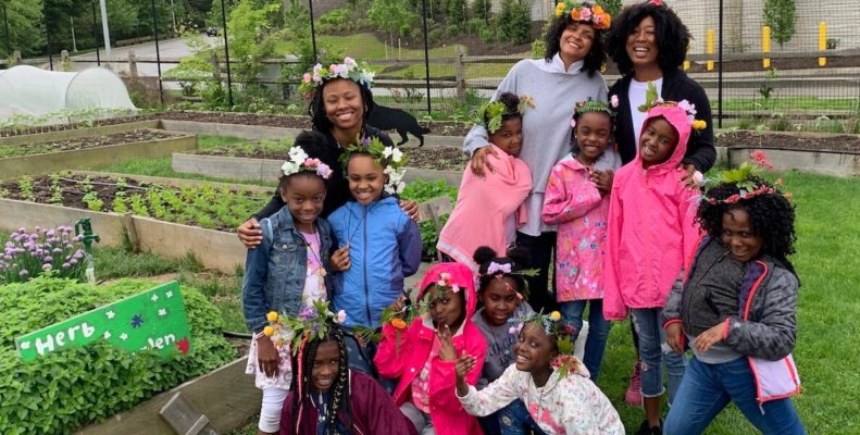 Young students with flower crowns participating in Get Fresh Daily